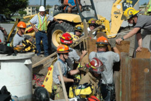 rescue workers at the scene of a construction site accident