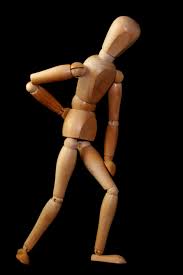 back pain indicated by wooden man